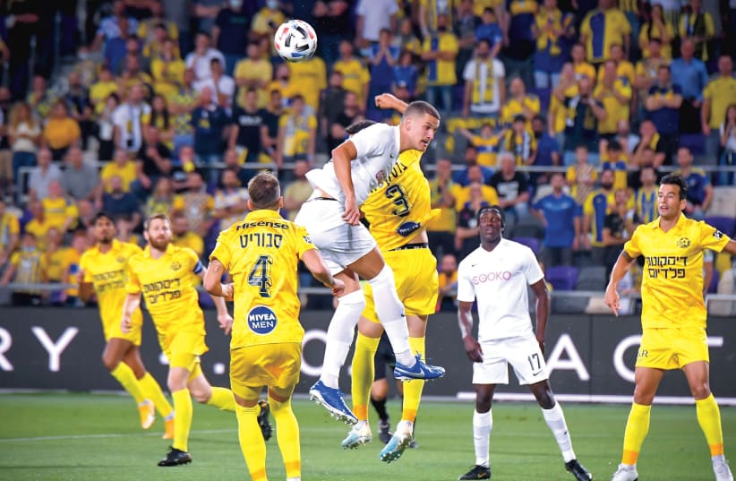 THE CHASE for the Israel Premier League championship looks like it will go down to the wire as Maccabi Tel Aviv dropped to second place with a 1-1 draw with Ashdod SC. (photo credit: ARIEL SHALOM)
