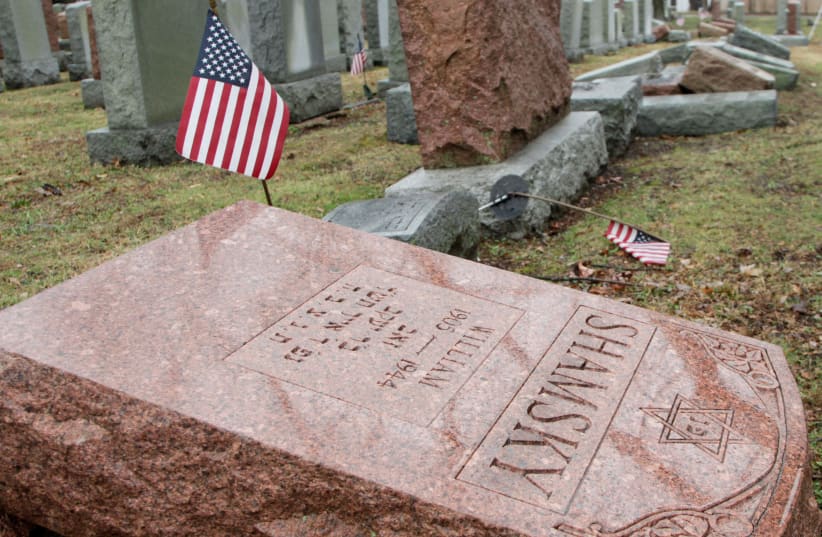 TOPPLED JEWISH headstones – 170 in total – vandalized in Chesed Shel Emeth Cemetery in St. Louis, Missouri, back in 2017 (photo credit: REUTERS/TOM GANNAM)