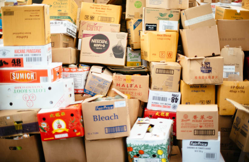 I ENDED up minimizing from the 31 boxes stashed in my childhood closet, Illustrative (photo credit: CHUTTERSNAP/UNSPLASH)