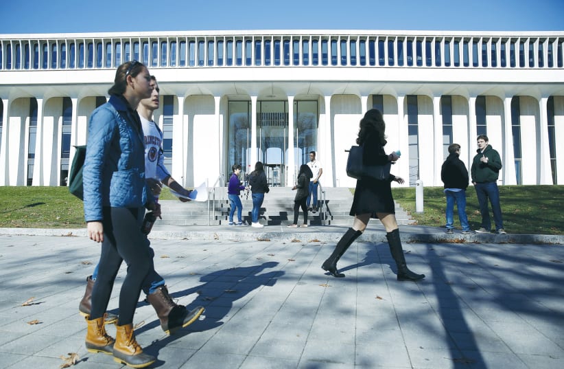 STUDENTS WALK along a path on the Princeton University campus. (photo credit: DOMINICK REUTER/ REUTERS)
