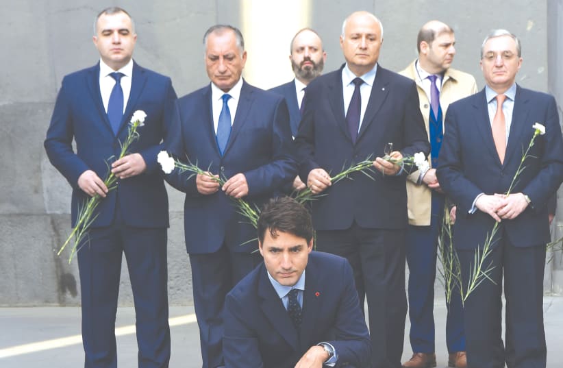 CANADIAN PRIME MINISTER Justin Trudeau takes part in a wreath-laying ceremony at the Tsitsernakaberd Armenian Genocide Memorial in Yerevan in 2018. Will an Israeli leader do the same one day? (photo credit: MELIK BAGHDASARYAN/REUTERS)