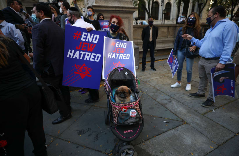 A crowd protests anti-Semitism in New York City, Oct. 15, 2020. (photo credit: TAYFUN COSKUN/ANADOLU AGENCY VIA GETTY IMAGES)