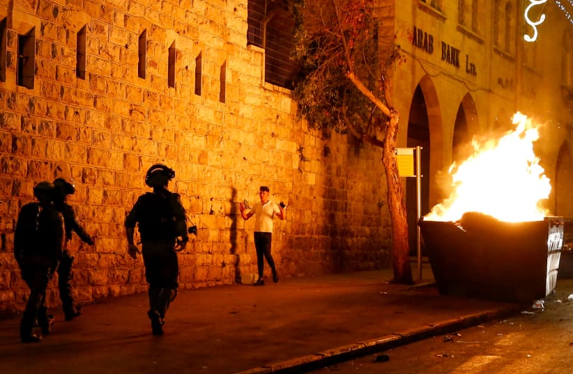 Israeli police officers clash with arabs in East Jerusalem on April 23, 2021 (photo credit: JAMAL AWAD/FLASH90)