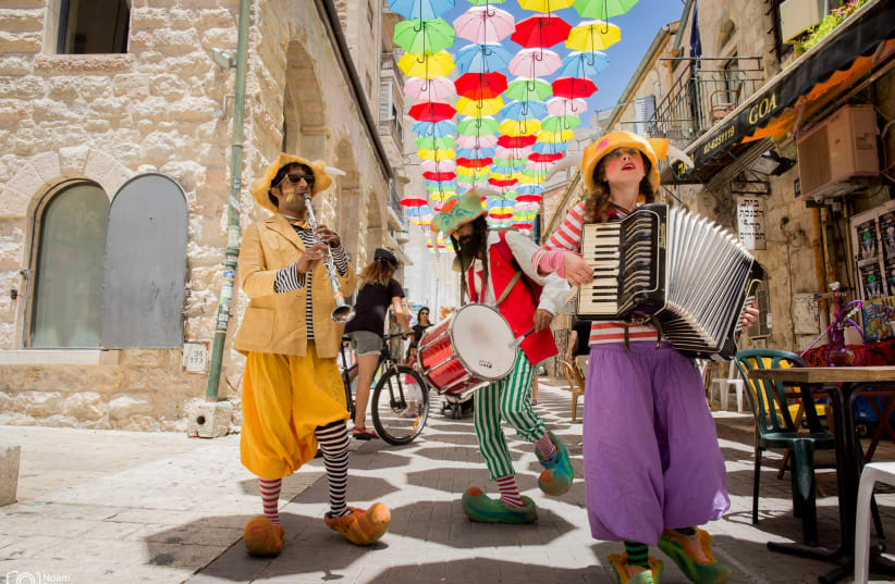 Umbrellas hung in Jerusalem from previous years (photo credit: NOAM FEINER)