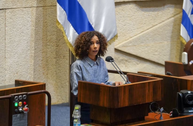 Labor MK Ibtisam Mara'ana-Menuhin delivers her opening speech at the Knesset plenum, April 27, 2021.  (photo credit: DANI SHEM TOV/KNESSET SPOKESPERSONS OFFICE)