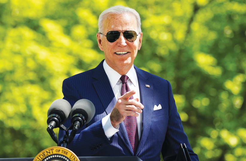 US PRESIDENT Joe Biden gestures to a reporter outside the White House this week. (photo credit: KEVIN LAMARQUE/REUTERS)