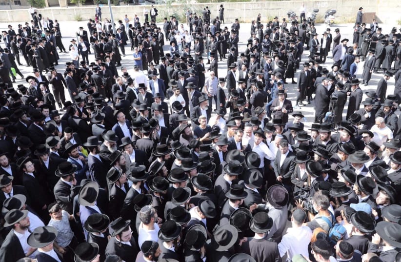 Mourners attend the funeral of one of the victims of the Meron stampede that took place on Lag Ba'omer. (photo credit: MARC ISRAEL SELLEM)