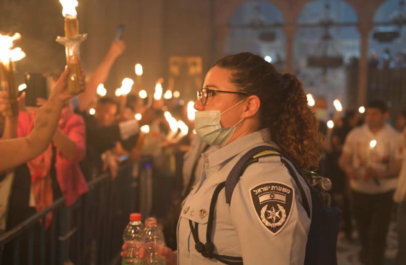 Holy Fire celebration at the Church of the Holy Sepulcher in the Old City of Jerusalem (photo credit: ISRAEL POLICE)