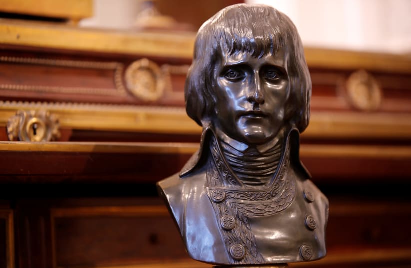  A bronze bust named "The First Consul Bonaparte" according to Louis-Simon Boizot (1743-1809) is displayed at Osenat auction house, before being put on auction for the bicentenary of Napoleon's death, in Fontainebleau, near Paris, France, April 30, 2021 (photo credit: REUTERS/SARAH MEYSSONNIER)