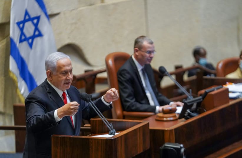 Prime Minister Benjamin Netanyahu is seen addressing the Knesset on May 3, 2021. (photo credit: DANI SHEM TOV/KNESSET SPOKESPERSONS OFFICE)