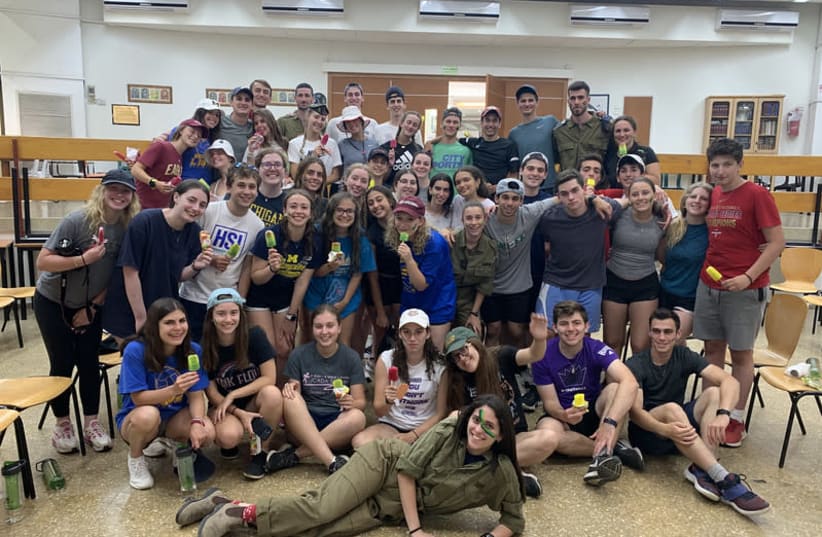 Charles E Smith Jewish Day School students earning their popsicles after a long day of outdoor experiential learning. (photo credit: JNF)