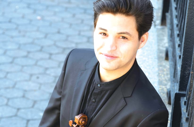 VIOLINIST ASI MATHATIAS: Seeing the audience coming back to the concert halls all over the world makes me really happy. (photo credit: Courtesy)