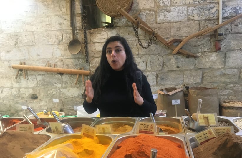 TOUR GUIDE Mona at the Elbabour spice mill (photo credit: BRIAN BLUM)