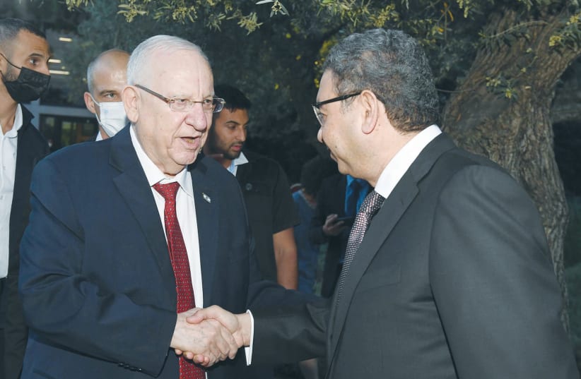 PRESIDENT REUVEN RIVLIN with Egyptian Ambassador Khaled Azmi, who was one of the guests at the iftar dinner hosted by Rivlin. (photo credit: HAIM ZACH/GPO)