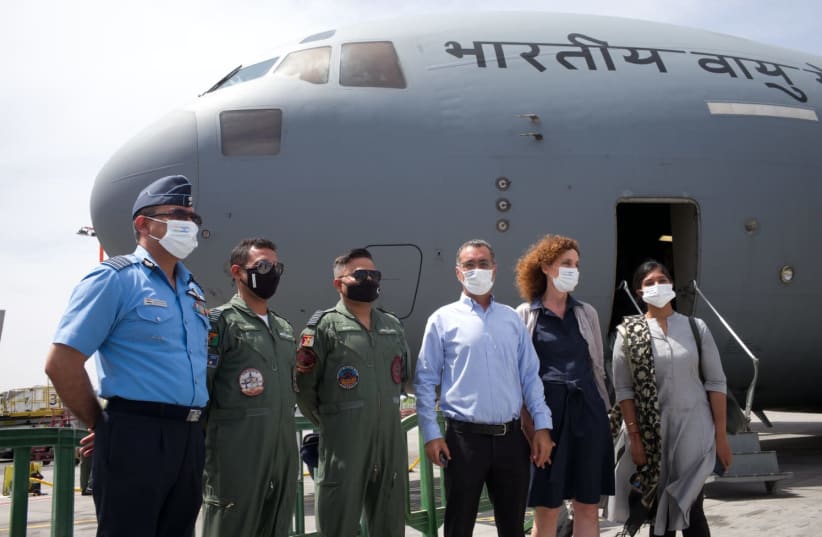 FROM LEFT to right: the air attaché at the Indian Embassy, the Indian Air Force flight team, Deputy Director General of Asia and the Pacific at the Ministry of Foreign Affairs, Gilad Cohen, Tami Ziv from the Economic Branch of the Foreign Ministry, and Indian Ambassador to Israel, Sanjeev Singla (photo credit: MINISTRY OF FOREIGN AFFAIRS)