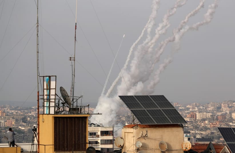 Rockets are launched into Israel from Gaza, May 10, 2021 (photo credit: MOHAMMED SALEM/REUTERS)