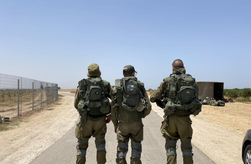 Three soldiers. (photo credit: ANNA AHRONHEIM)
