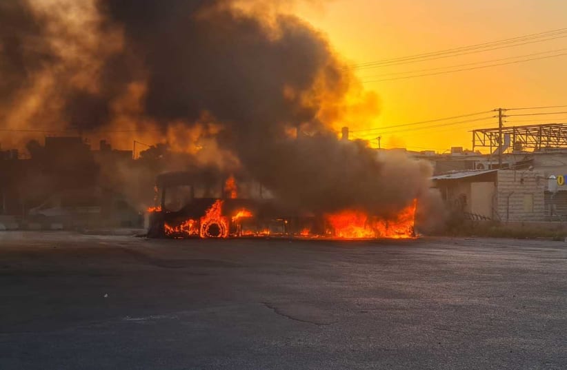 A burnt out bus after a day of riots in Lod, Israel, May 11, 2021 (photo credit: Courtesy)
