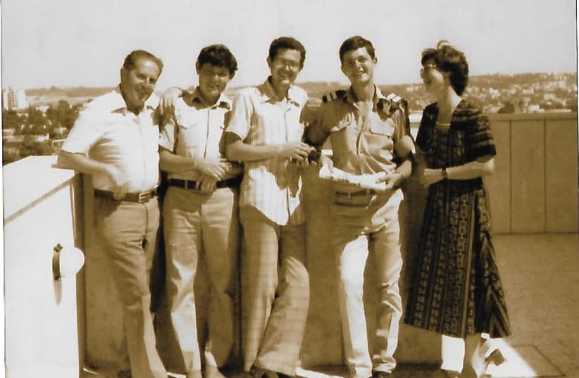 (FROM RIGHT) The writer with middle son Dov, then in the Israeli Air Force, eldest son Shimon, youngest son Daniel and husband Neville.  (photo credit: COURTESY PESSY KRAUSZ)