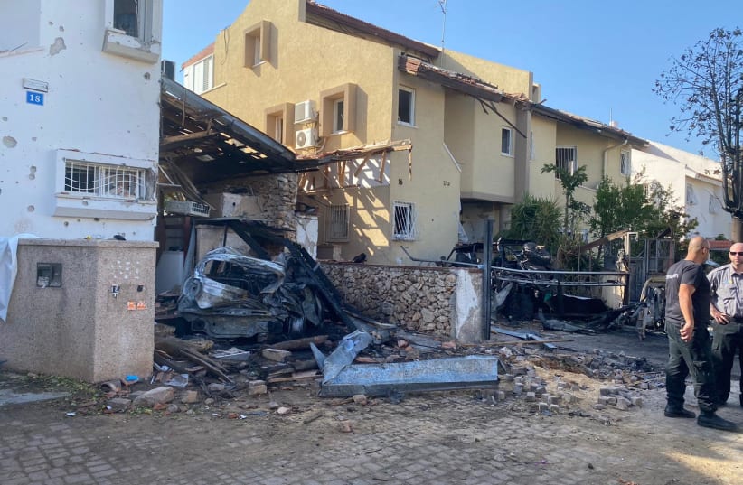 A home in Rishon Lezion is seen destroyed by rocket fire. Two women died: One from the strike, one from a heart attack. (photo credit: ANNA AHRONHEIM)
