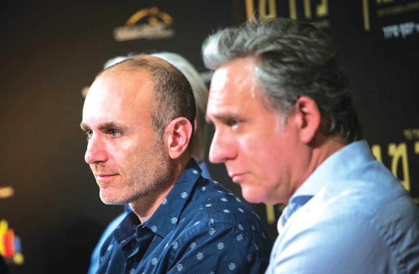 DIRECTOR JOSEPH CEDAR (left) and actor Lior Ashkenazi attend a press conference about their movie ‘Norman’ in 2017. (photo credit: YONATAN SINDEL/FLASH90)
