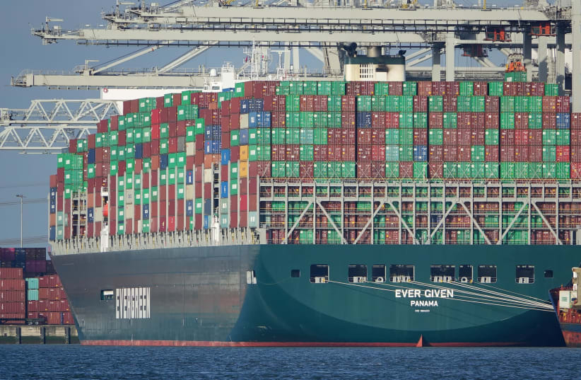 THE ‘EVER GIVEN’ container ship became lodged in the Suez Canal, blocking maritime traffic for almost a week. (photo credit: PIERRE MARKUSE/FLICKR)