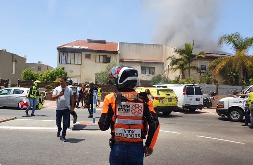 Avi Amar at a rocket explosion in Ashdod (photo credit: UNITED HATZALAH‏)