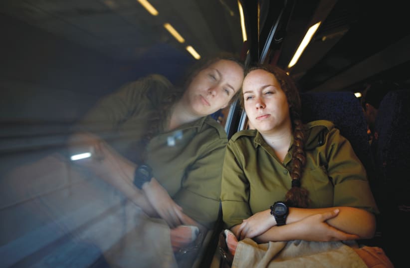 Traveling on the high-speed rail line from Ben-Gurion Airport to Jerusalem (photo credit: AMIR COHEN/REUTERS)