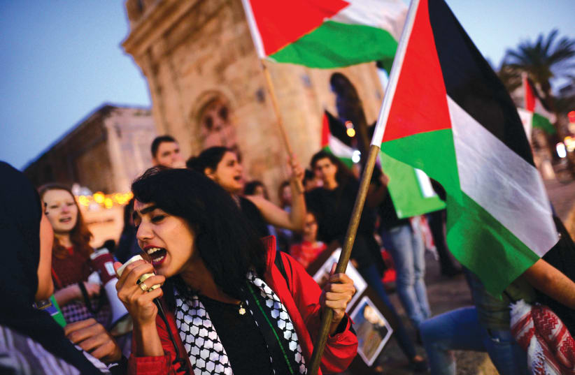 DEMONSTRATORS PROTEST the killing of Palestinians in Gaza, at the Jaffa Clock Tower square in 2018. (photo credit: TOMER NEUBERG/FLASH90)