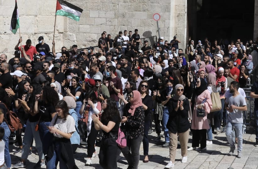 Crowds gather at Damascus Gate in Jerusalem's Old City in response to Fatah's call for a Palestinian "Day of Rage," May 18th, 2021. (photo credit: MARC ISRAEL SELLEM/THE JERUSALEM POST)