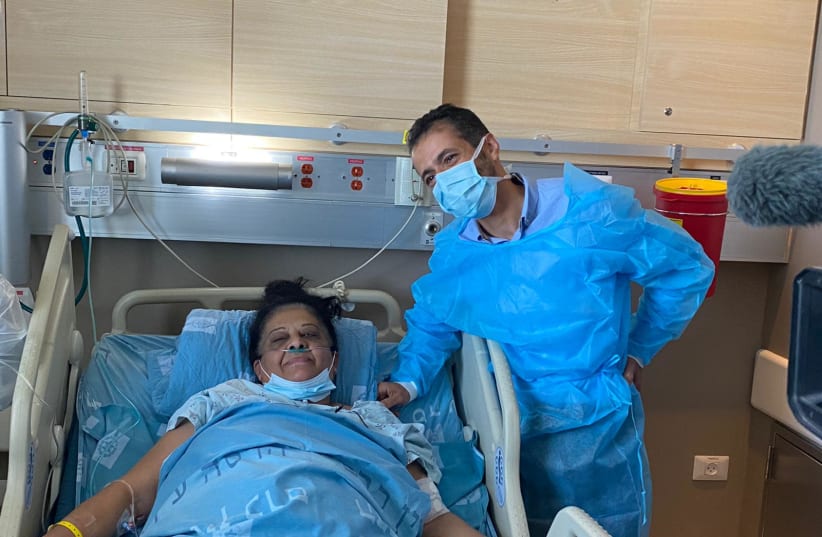 Randa Aweis and Dr. Abed Halaila shortly at Hadassah-University Medical Center shortly after Aweis received a new kidney from Lod lynch victim Yigal Yehoshua.  (photo credit: HADASSAH)