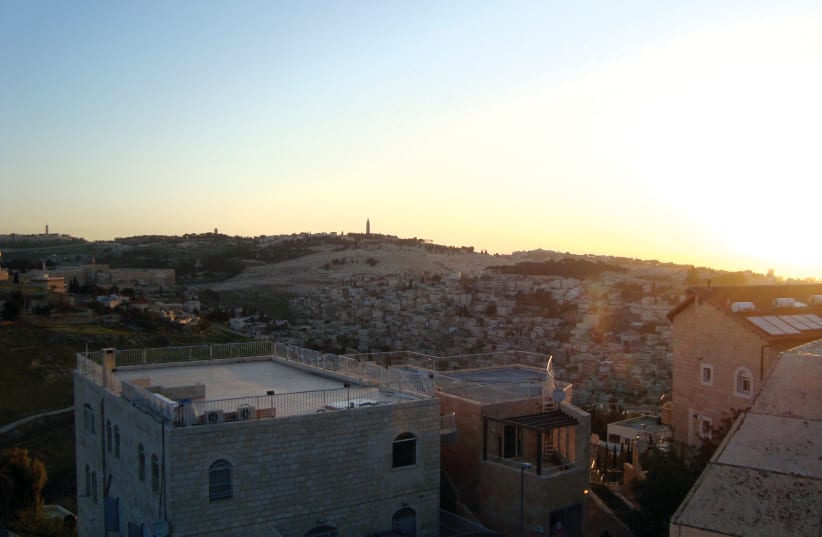 SUNRISE OVER Jerusalem from the mixed neighborhood of Abu Tor. (photo credit: Courtesy)