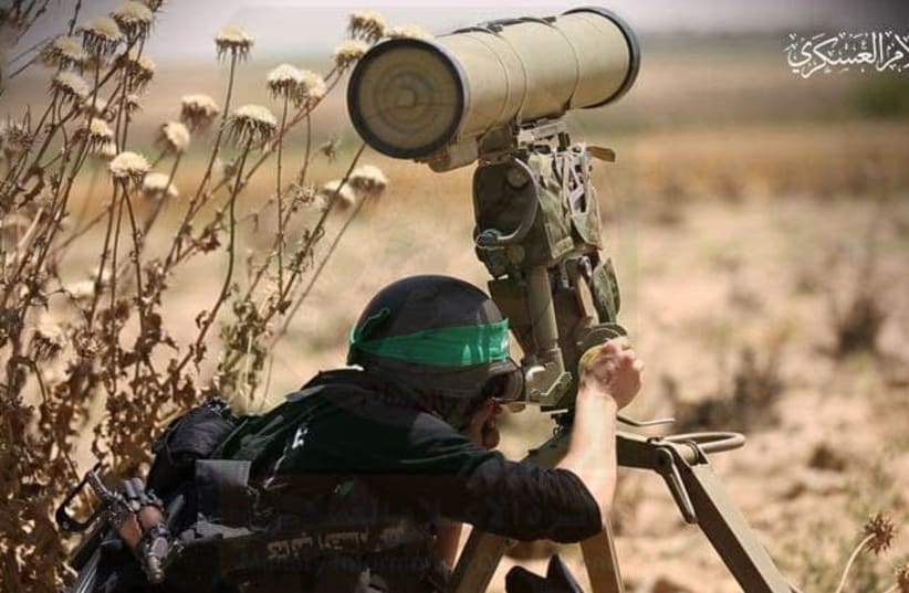 Hamas Al-Qassam Brigades terrorist with anti-tank missile (photo credit: IZZADIN AL-QASSAM BRIGADES)