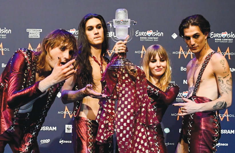 ITALY’S MANESKIN pose with the trophy after winning the 2021 Eurovision Song Contest, in Rotterdam, Saturday night.  (photo credit: PIROSCHKA VAN DE WOUW/REUTERS)