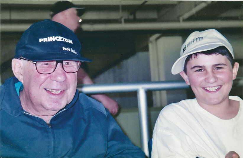 THE AUTHOR’S father and son at a game on April 27, 2003, when Kevin Millwood pitched a no-hitter against Barry Bonds and the San Francisco Giants. (photo credit: Courtesy)