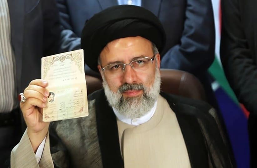 Iran's Judiciary chief Ebrahim Raisi is seen registering for the 2017 Iranian presidential elections. (photo credit: Wikimedia Commons)