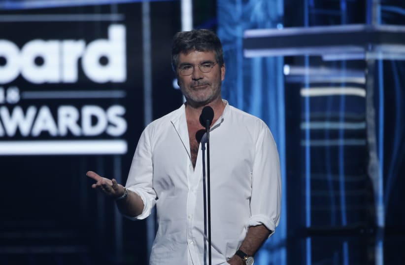 2018 Billboard Music Awards - Show - Las Vegas, Nevada, US, 20/05/2018 - Simon Cowell speaks on stage.  (photo credit: REUTERS/MARIO ANZUONI)