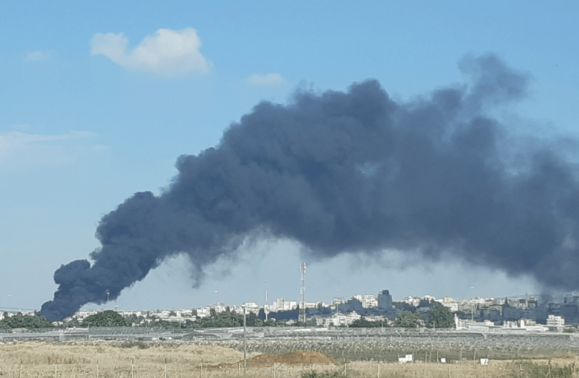 A BLACK plume rises from the Nitzanei Shalom industrial area (photo credit: CITIZENS FOR CLEAN AIR)