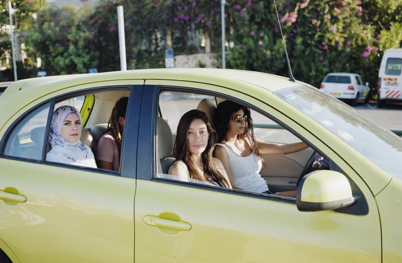 THE FOUR Israeli-Arab female students: Samar, Aya, Saja and Manar driving in Ramat Aviv, 2014  (photo credit: IRIS HASSID)
