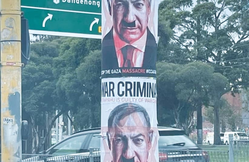 A POSTER at a busy Melbourne intersection depicts Prime Minister Benjamin Netanyahu as Hitler. (photo credit: Courtesy)