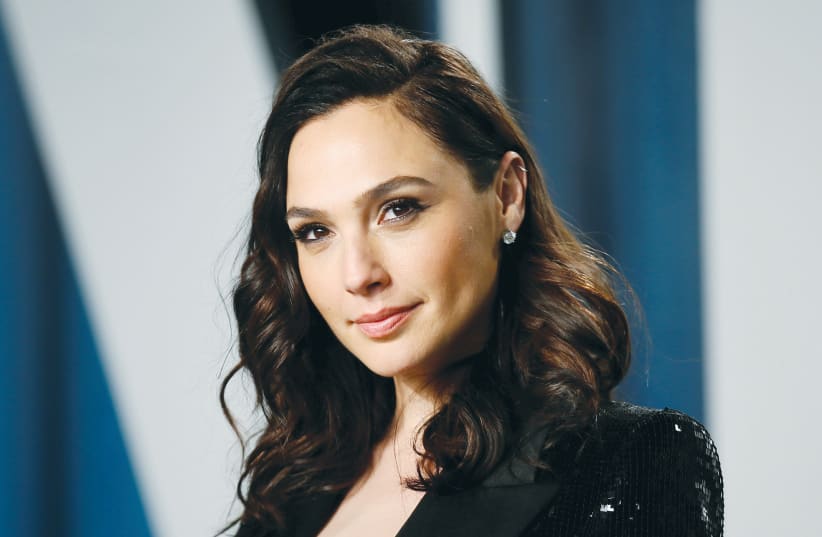 THOUSANDS OF PEOPLE pressured Gal Gadot, as an Israeli who lives abroad and has many followers, to tweet, post or otherwise utter a word in favor of the state.  (photo credit: DANNY MOLOSHOK/ REUTERS)