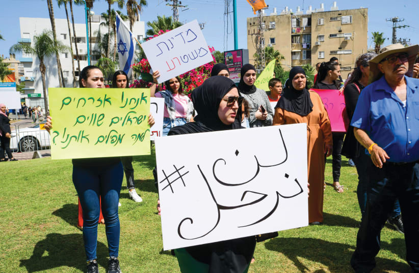 ARAB RESIDENTS and activists protest the death of Musa Hasuna, killed during Jewish-Arab clashes, outside Lod District Court on May 28. (photo credit: AVSHALOM SASSONI/FLASH90)