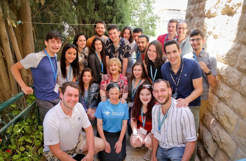 RENA QUINT (center) with Birthright participants (photo credit: YONIT SCHILLER)