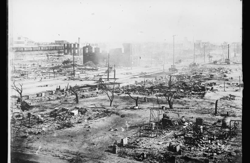 A contemporary photograph shows the ruins of the Greenwood District in Tulsa, Okla., after a white mob and local law enforcement attacked and killed hundreds of the neighborhood's Black residents, June 1921. (photo credit: LIBRARY OF CONGRESS)