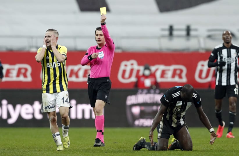 Soccer Football - Super Lig - Besiktas v Fenerbahce - Vodafone Park, Istanbul, Turkey - March 21, 2021 Fenerbahce's Dimitris Pelkas reacts after being shown a yellow card by referee Halil Umut Meler  (photo credit: REUTERS/MURAD SEZER)