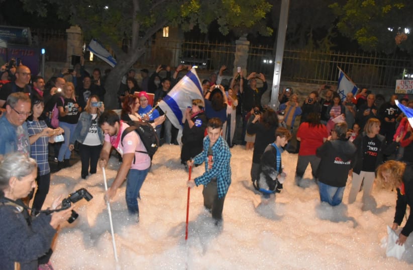  "Cleaning the incitement out of Balfour," protesters at Balfour bring foam machine to protest, June 5, 2021 (photo credit: CRIME MINISTER)
