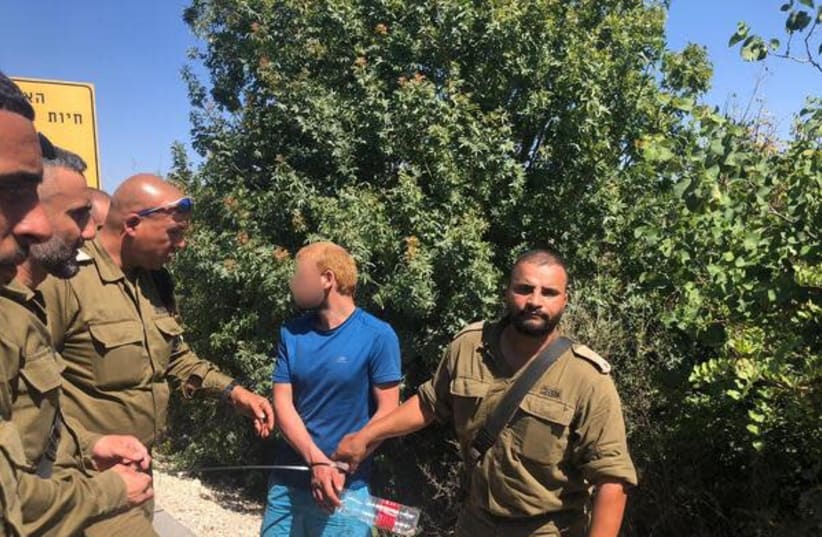 Suspect arrested by IDF for infiltrating Israel-Lebanon border. (IDF spokesperson) (photo credit: IDF SPOKESPERSON'S UNIT)