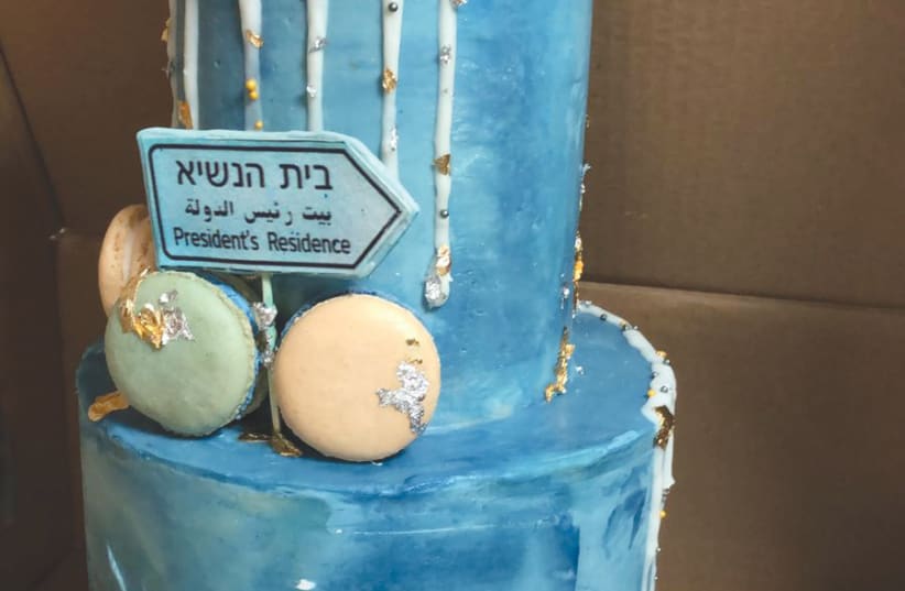 A PRESIDENTIAL cake sent to President-elect Isaac Herzog and transferred by him to new immigrants at Ulpan Etzion. (photo credit: Courtesy)