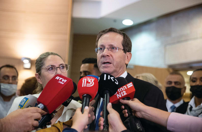 ISAAC HERZOG faces the press on presidential election day, June 2.   (photo credit: YONATAN SINDEL/FLASH 90)