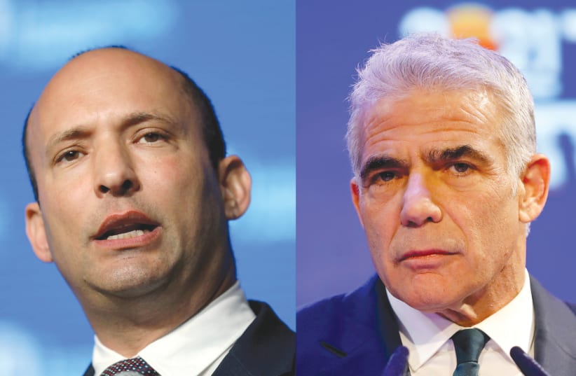 THE NEW Israeli government is ruled by the ‘non-decision-making process’ in the mutual veto power granted to Yamina Party leader Naftali Bennett (left) and Yesh Atid Party leader Yair Lapid. (photo credit: AMMAR AWAD/AMIR COHEN/REUTERS)